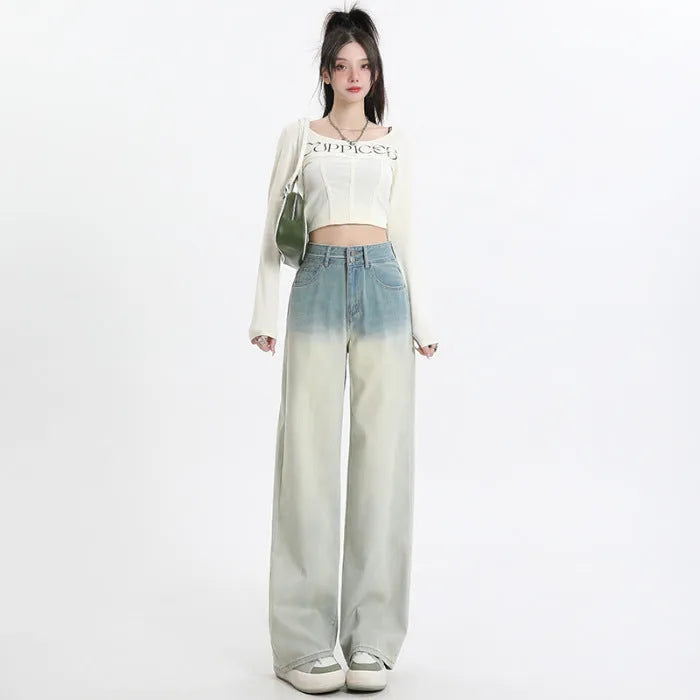 Women's gradient blue wide leg straight-leg denim trousers laid flat.