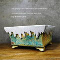 White glazed stoneware ceramic flowerpot for plants