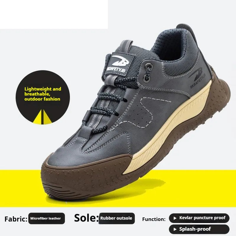 A pair of Flyknit safety work shoes with a leather upper and rubber sole, shown in a neutral colour.