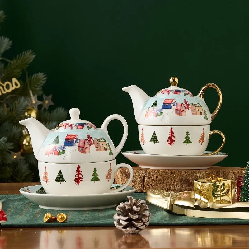 Ceramic tea set with gold-plated teapot and matching cup on dish, snowflake pattern, gift box