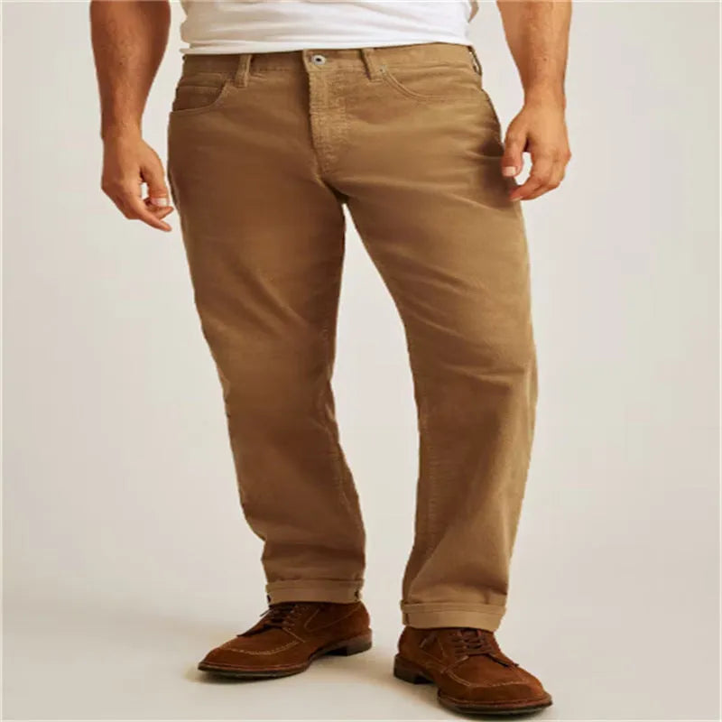 Corduroy straight-leg trousers in loose casual fit showing mid-waist design and solid colour options