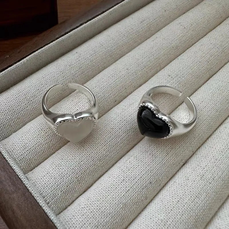 Open mouth adjustable sterling silver ring with black agate electroplated finish and heart design