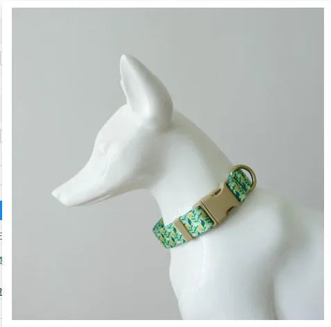 Nylon ribbon pet collar with floral pattern in Hanada blue colour, showing adjustable sizing and flower decoration