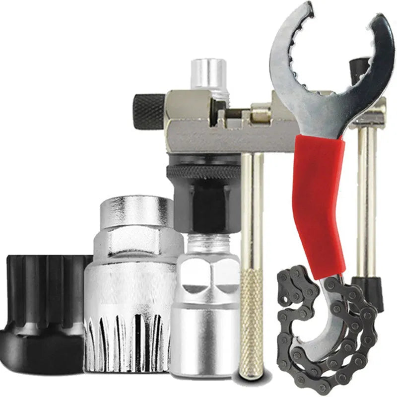Bicycle maintenance tool set with silver chain cutter and spoke wrench on workshop bench