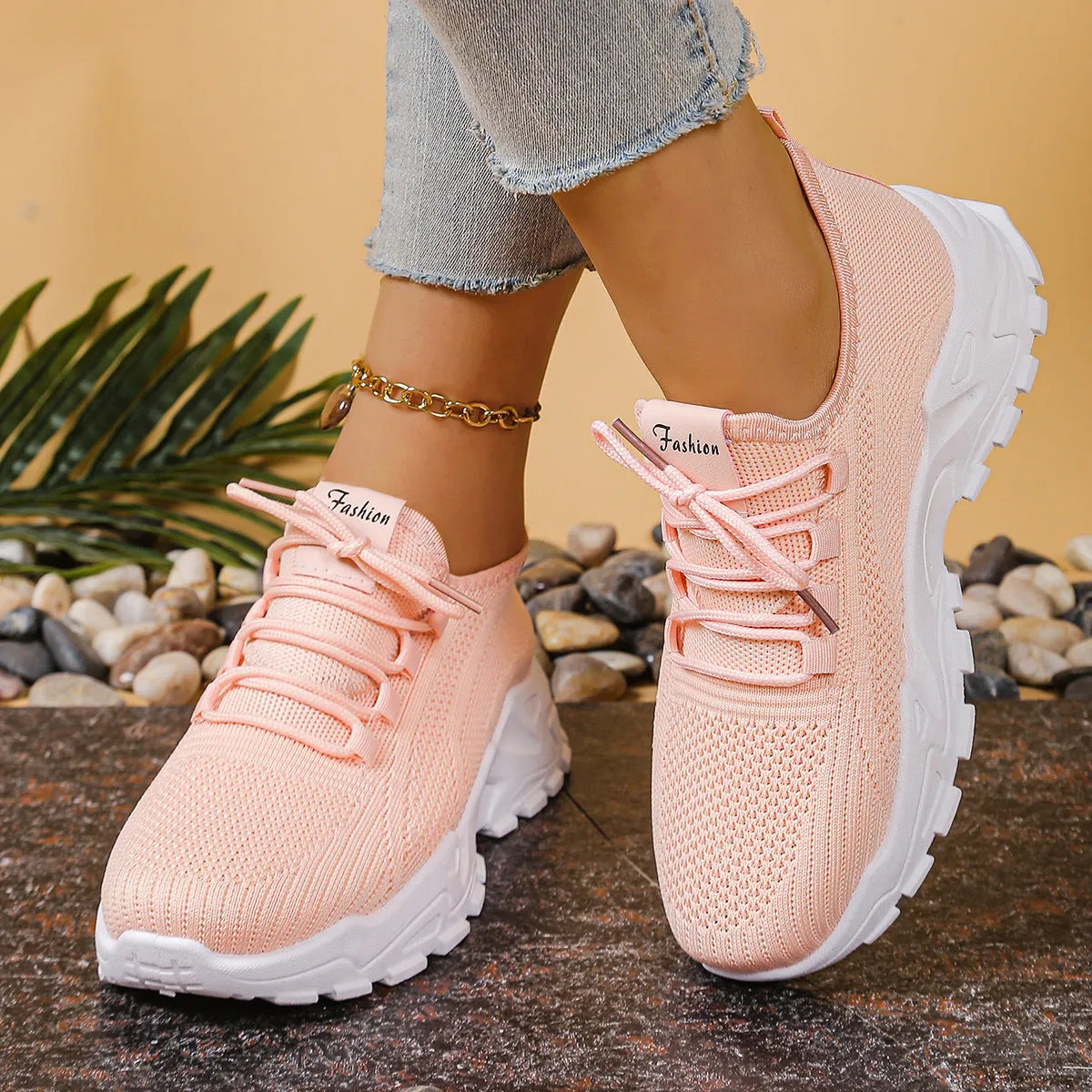 Women's low-top mesh sports shoes in beige with a platform sole and lace-up front.