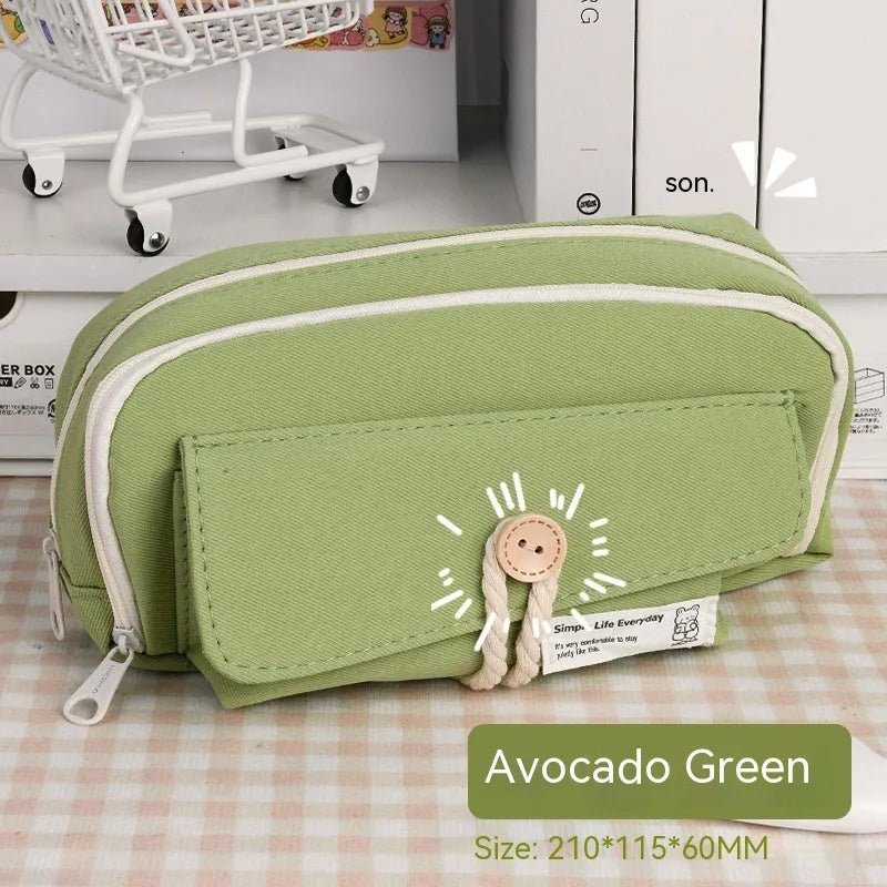 Green canvas button pencil case showing large capacity for pens in Korean style design.