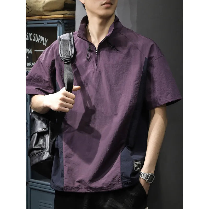 Brown men's half-zip stand collar casual shirt with short sleeves on a hanger.