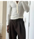 Men's cream coloured ribbed long sleeve henley top with three-button placket