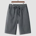 Men's linen shorts in loose cropped style with elastic waistband in various colours