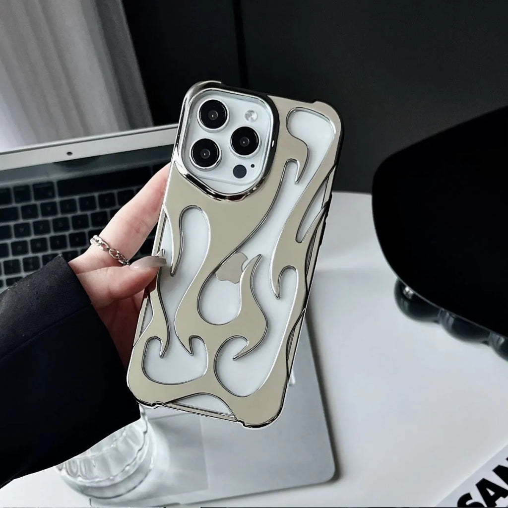Silver electroplated iPhone case with hollow flame pattern design on a dark background