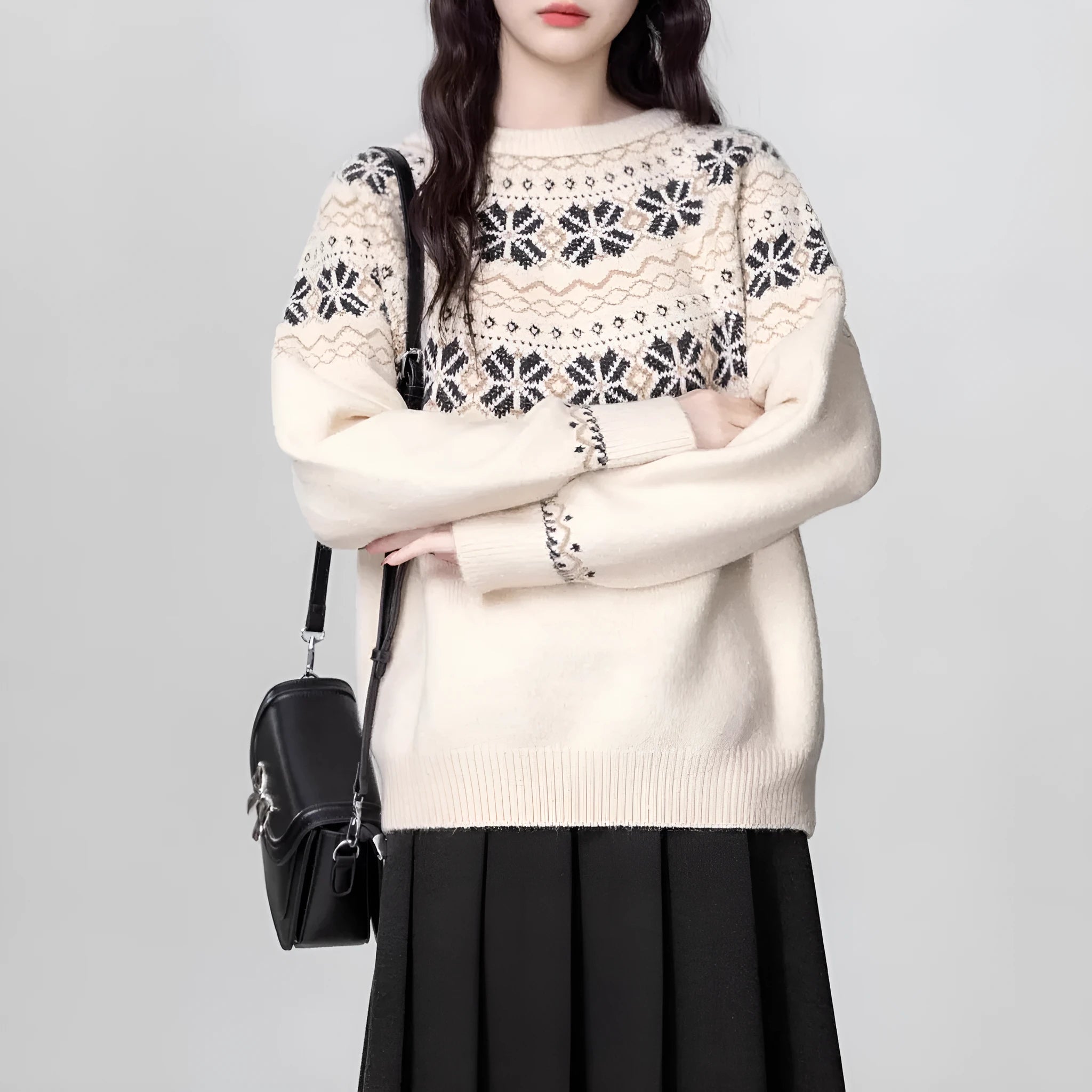 Women's Milky White vintage Fair Isle geometric knit pullover sweater on a hanger.