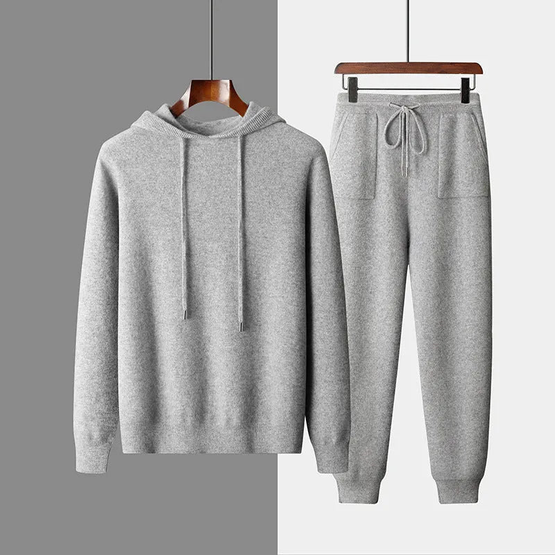 Men's light grey cashmere knitted hoodie and matching long pants casual set laid flat.