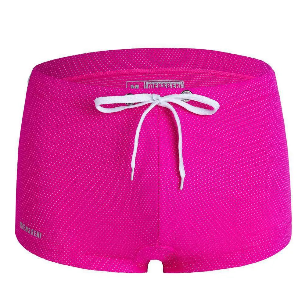 Men's solid colour nylon lace low waist swimming trunks in boxer briefs style.