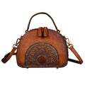 Vintage suede cowhide leather handbag showing interior organisation compartments