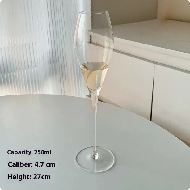 Set of six French-design champagne glasses in various crystal goblet styles including tulip and flute shapes
