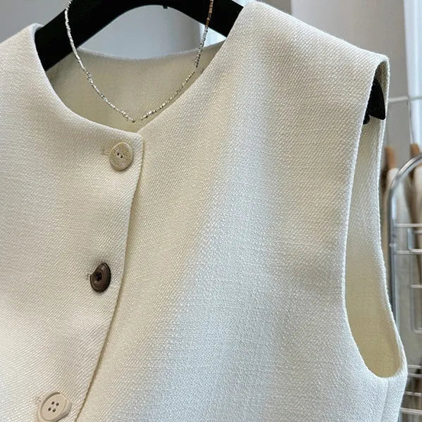 Women's French style round neck bandage vest in polyester fabric, available in milky white and black colours