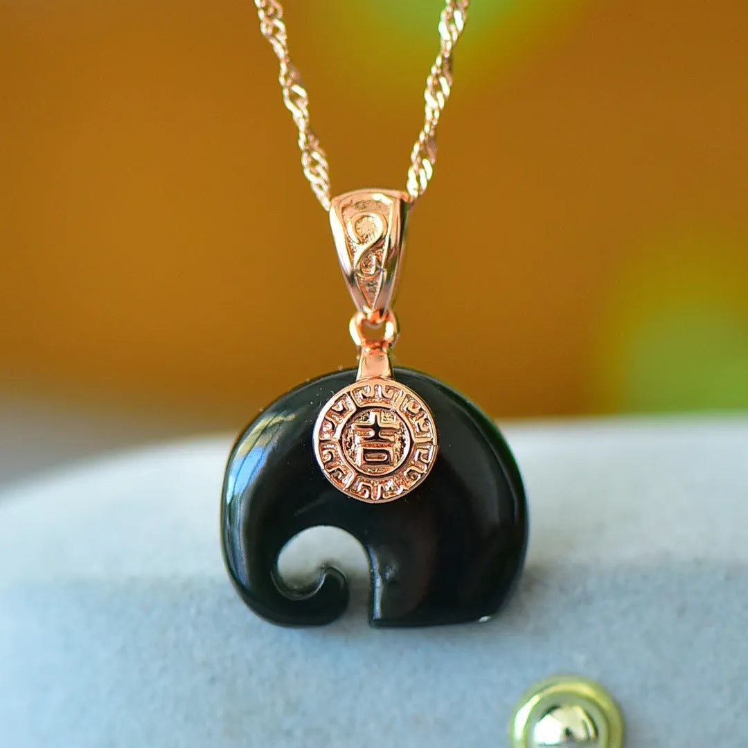 Flat polished Hetian Grey Jade pendant with copper inlay and Ink Blue Jade accents on a necklace.