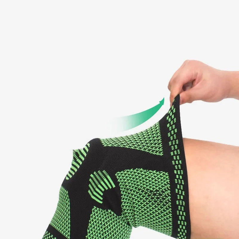 Blue silicone spring knee pad for sports, shown on a leg, suitable for volleyball and gym workouts.