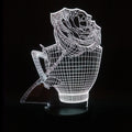 3D rose flower design night light showing colour-changing LEDs on acrylic panel with black ABS base.