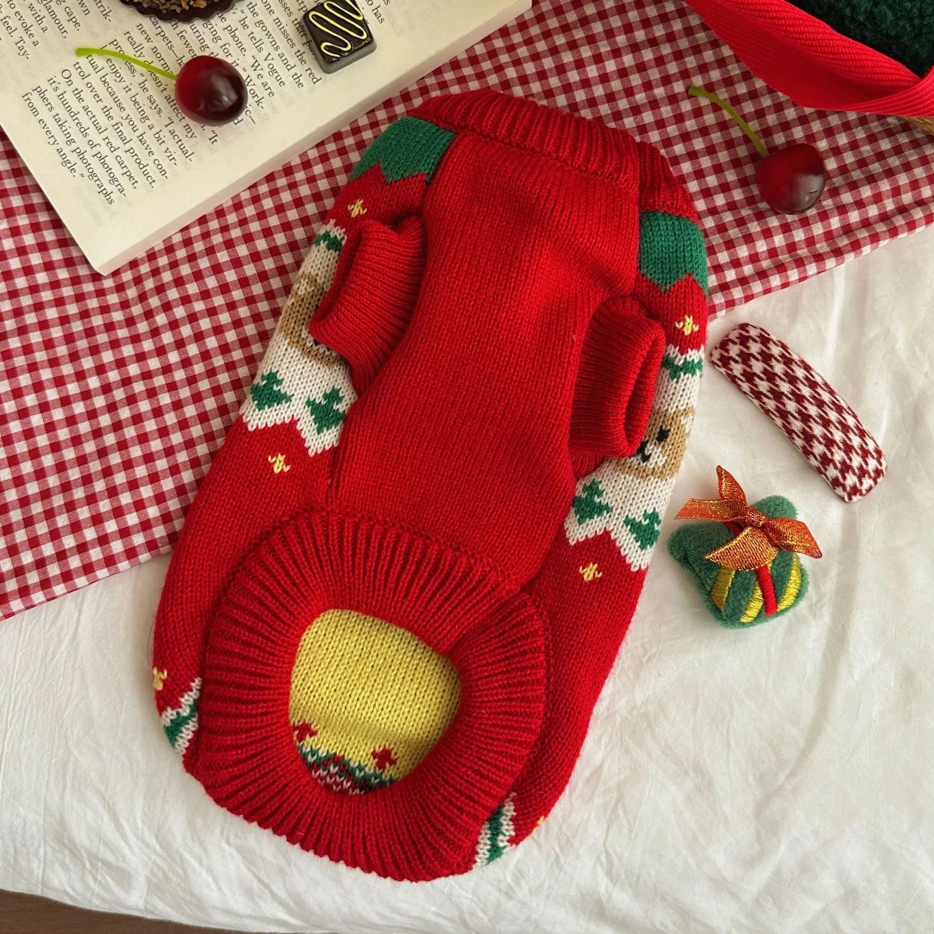 Red Christmas cherry print knitted sweater for a small dog or cat, shown in size L.