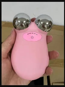 Pink and white microcurrent facial lifting device for skin firming treatments