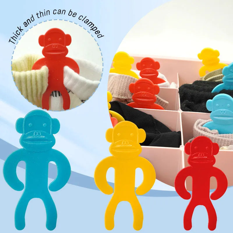 Plastic socks storage clips in blue, red, and yellow colours for machine wash anti-winding organisation