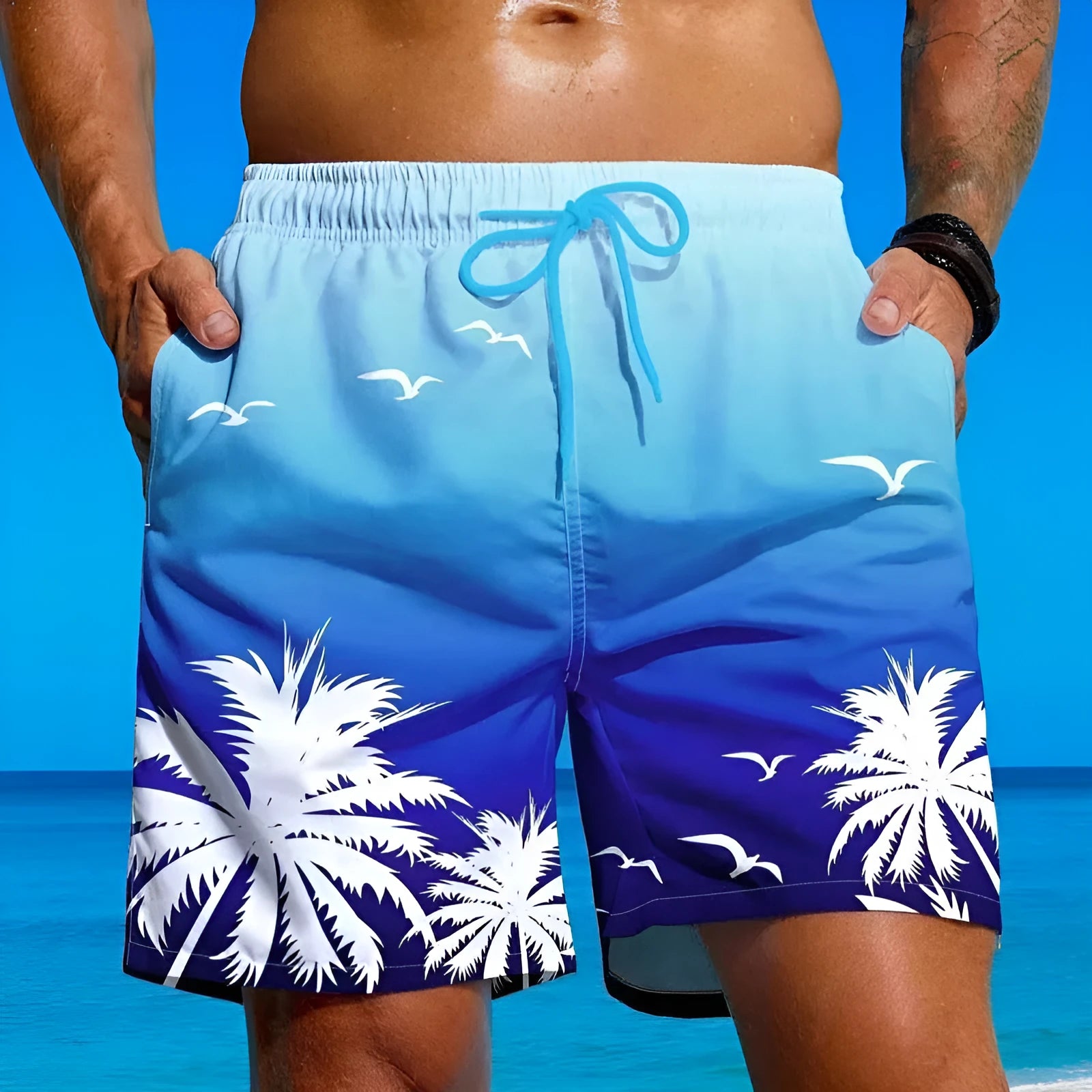 Men's loose fit swimming trunks in polyester fabric with ethnic style design