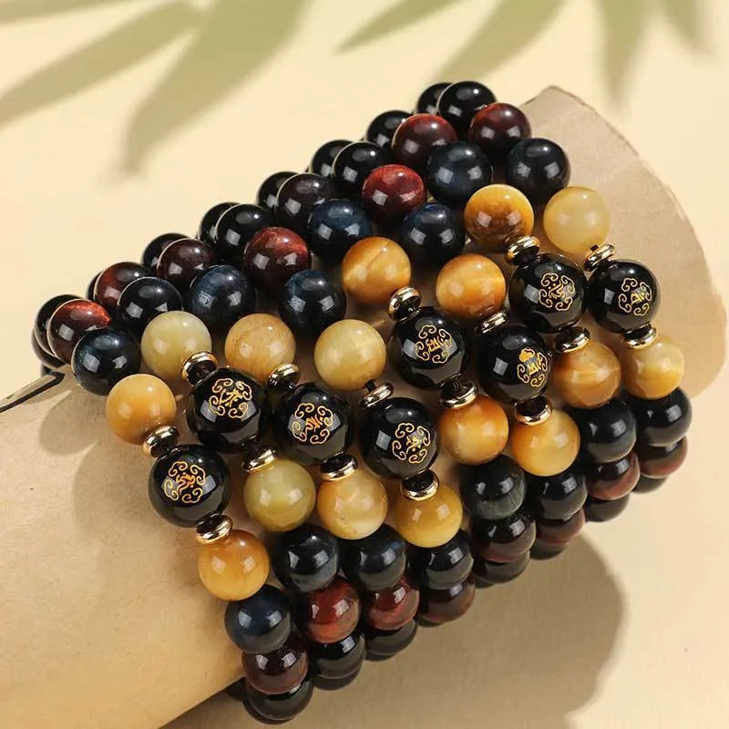 Black agate zodiac animal beaded bracelet with gold, blue and red tiger eye stones