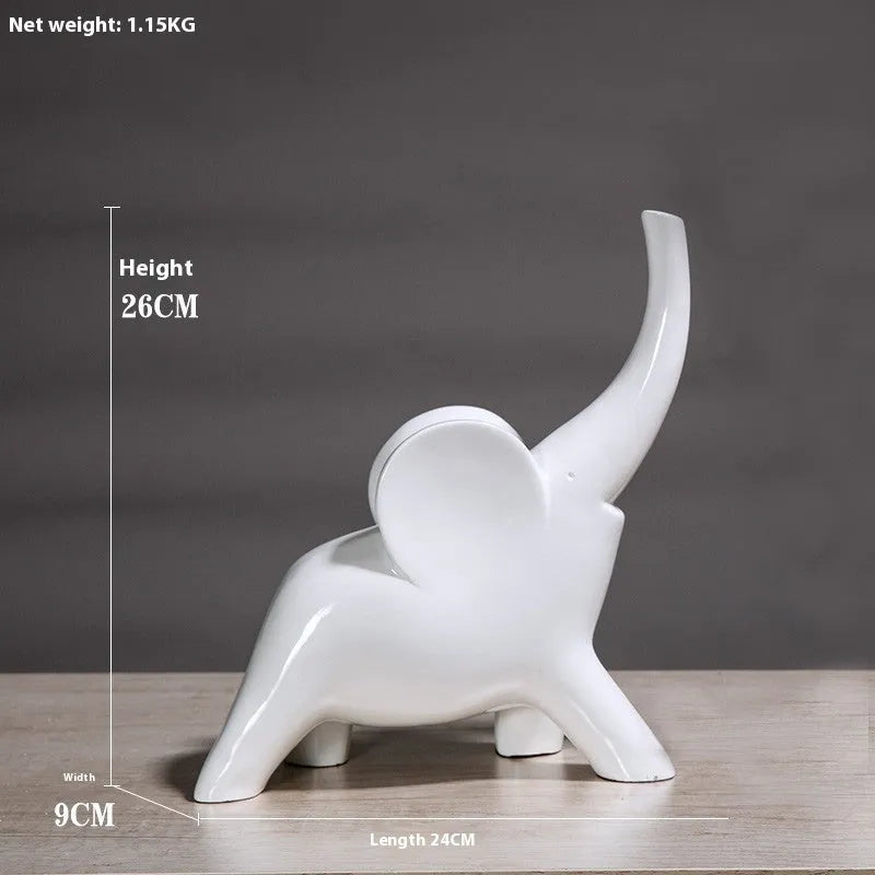 Modern minimalist elephant figurine ornament in rose gold or white resin on a plain background.
