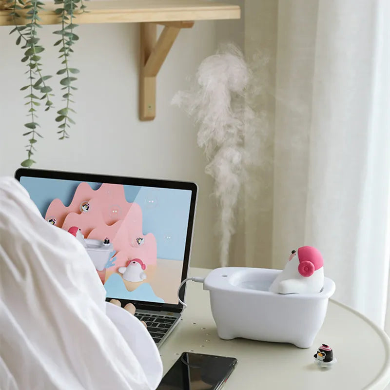 White creative USB air humidifier with large water tank on a desk.