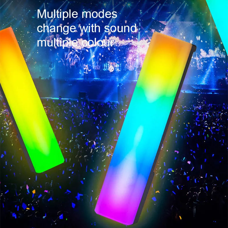 3D RGB music rhythm table lamp with voice control in black or white shell on a desk.