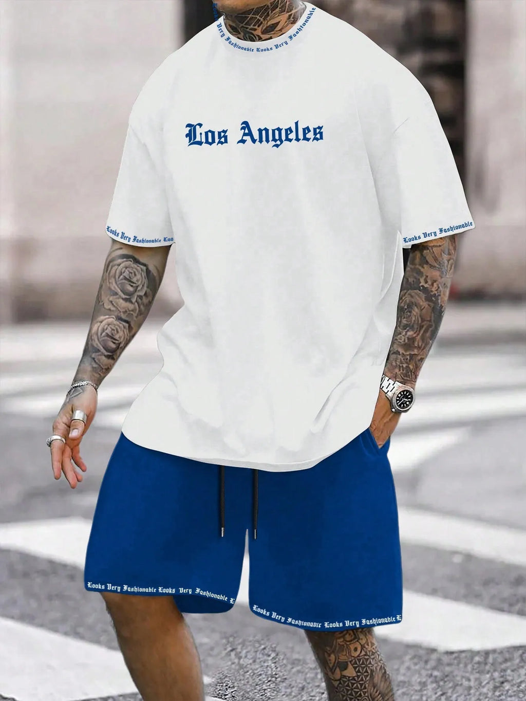Men's blue sports style short-sleeved top and matching shorts two-piece casual suit set