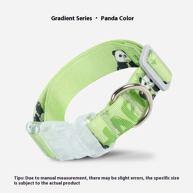 Adjustable nylon dog collar with a colourful cartoon gradient print and a metal D-ring, shown in panda green.