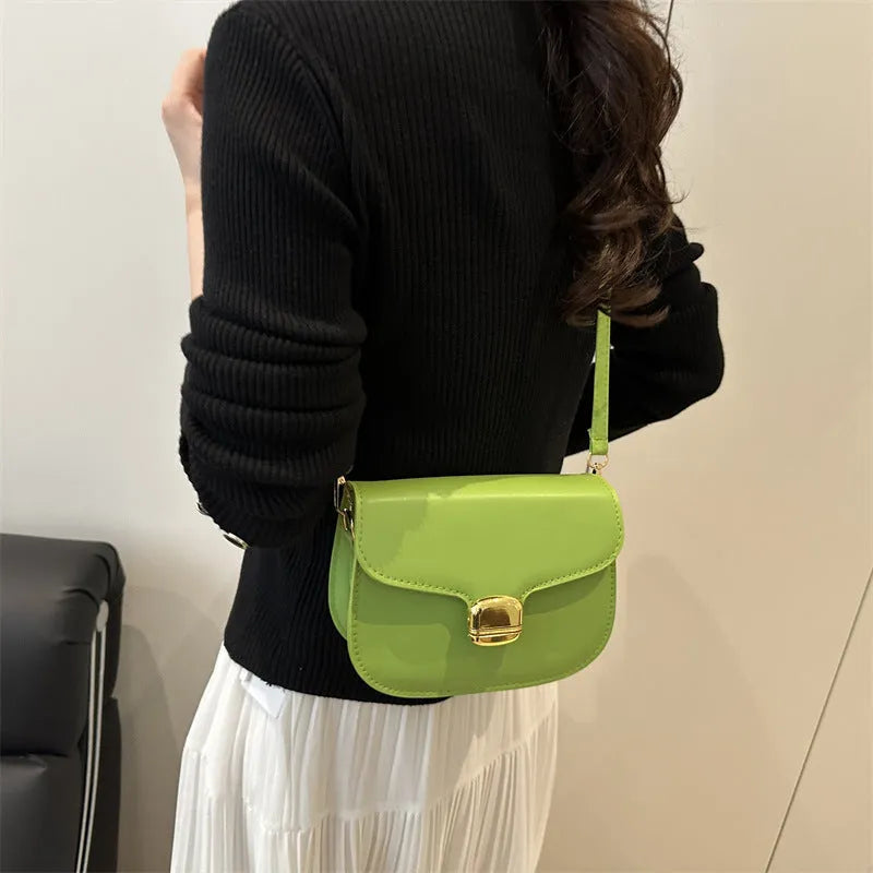 Simple PU leather women's handbag in khaki with internal zipper pocket and phone compartment.