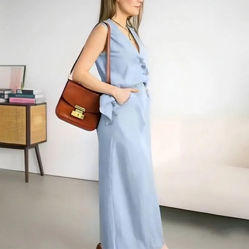 Casual loose fit two-piece suit with a sleeveless vest and a long skirt in blue.