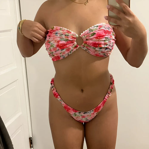 Blue floral print bikini set with lace trim on a sleeveless tube top and matching briefs.