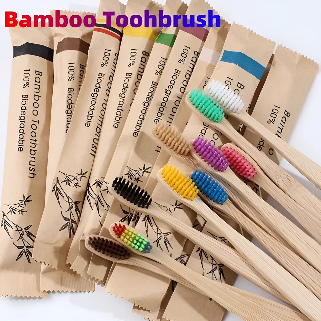 Set of ten bamboo toothbrushes with charcoal bristles in assorted colours on a plain background