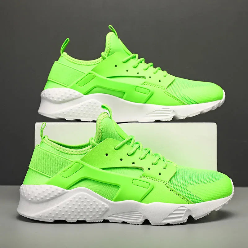 Men's mesh casual shoes with cross shoulder straps in green colour with front lace-up design