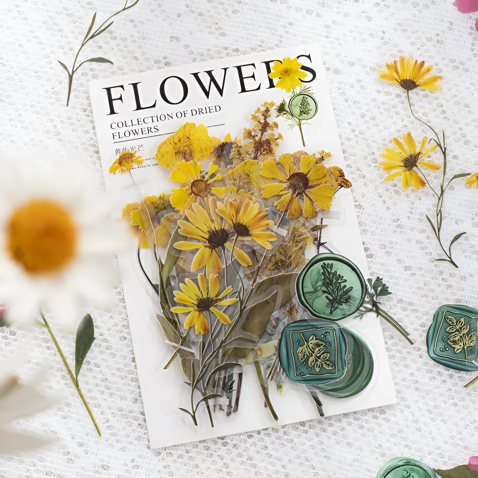 Set of 40 printed PET decorative stickers showing eight artistic styles including dried flowers and leaf specimens.