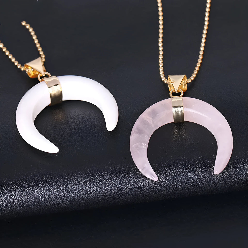 Natural stone moon pendant necklace with electroplated copper chain, shown in pink and purple colour options.