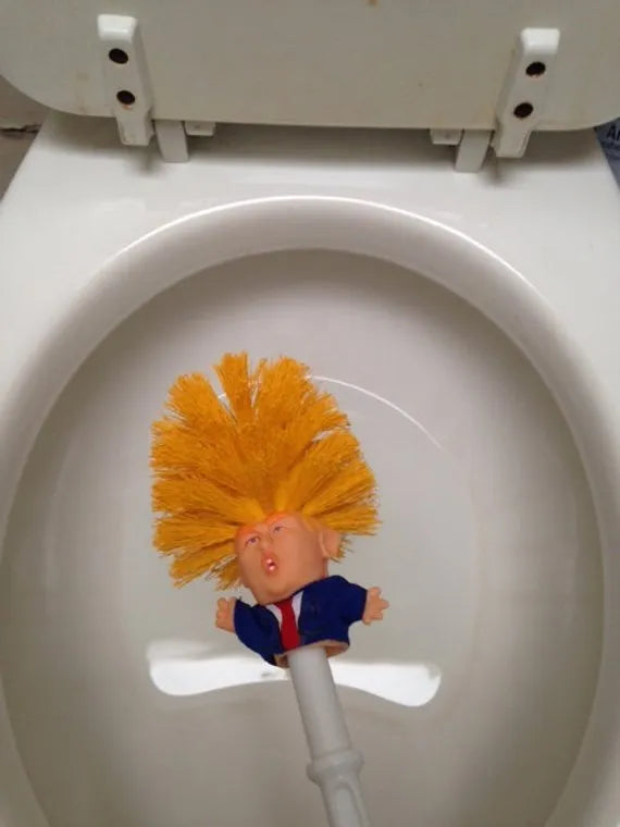 Yellow plastic Donald Trump toilet brush with 40cm length and hanging slot handle