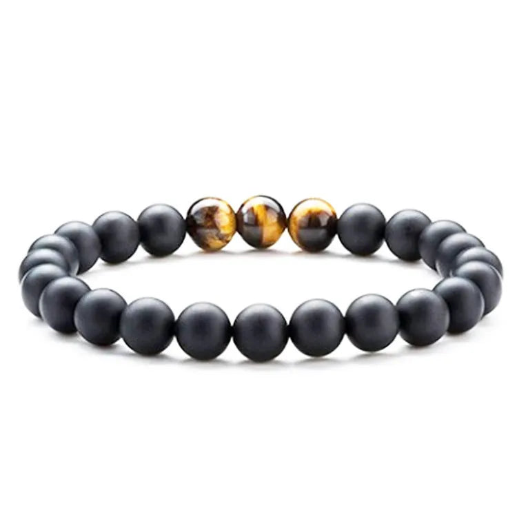 Geometric agate couple bracelets in tiger eye and matte black beads.