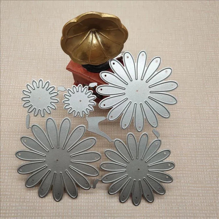 Silver high carbon steel flower combination cutting die mould measuring 12.5 by 13 cm