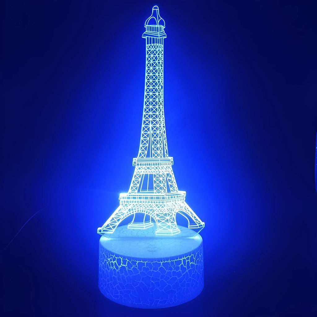 Eiffel Tower shaped table lamp with multi-colour 3D visual slide design and acrylic lampshade.
