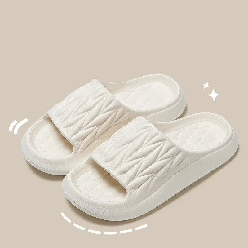 Leaf texture design EVA foam indoor slippers in assorted colours on a white background.