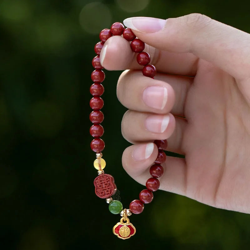 Fu character cinnabar and emperor sandstone beaded bracelet in new Chinese style.