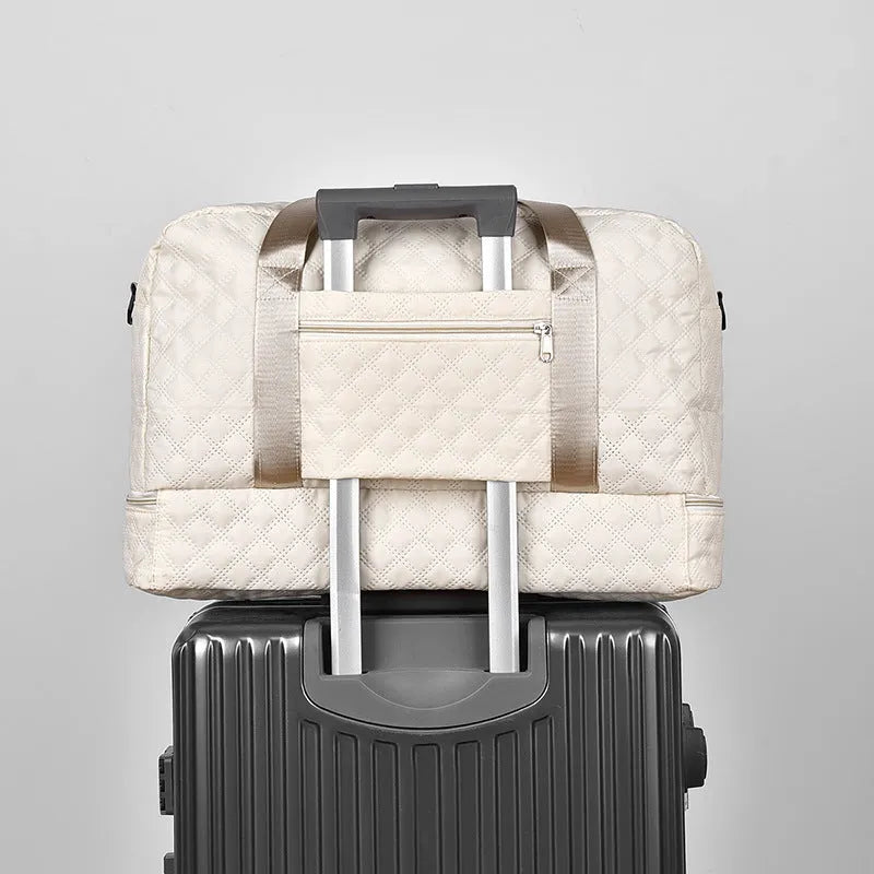 Oxford cloth leisure travel bag in a solid colour with a 36-55L capacity.