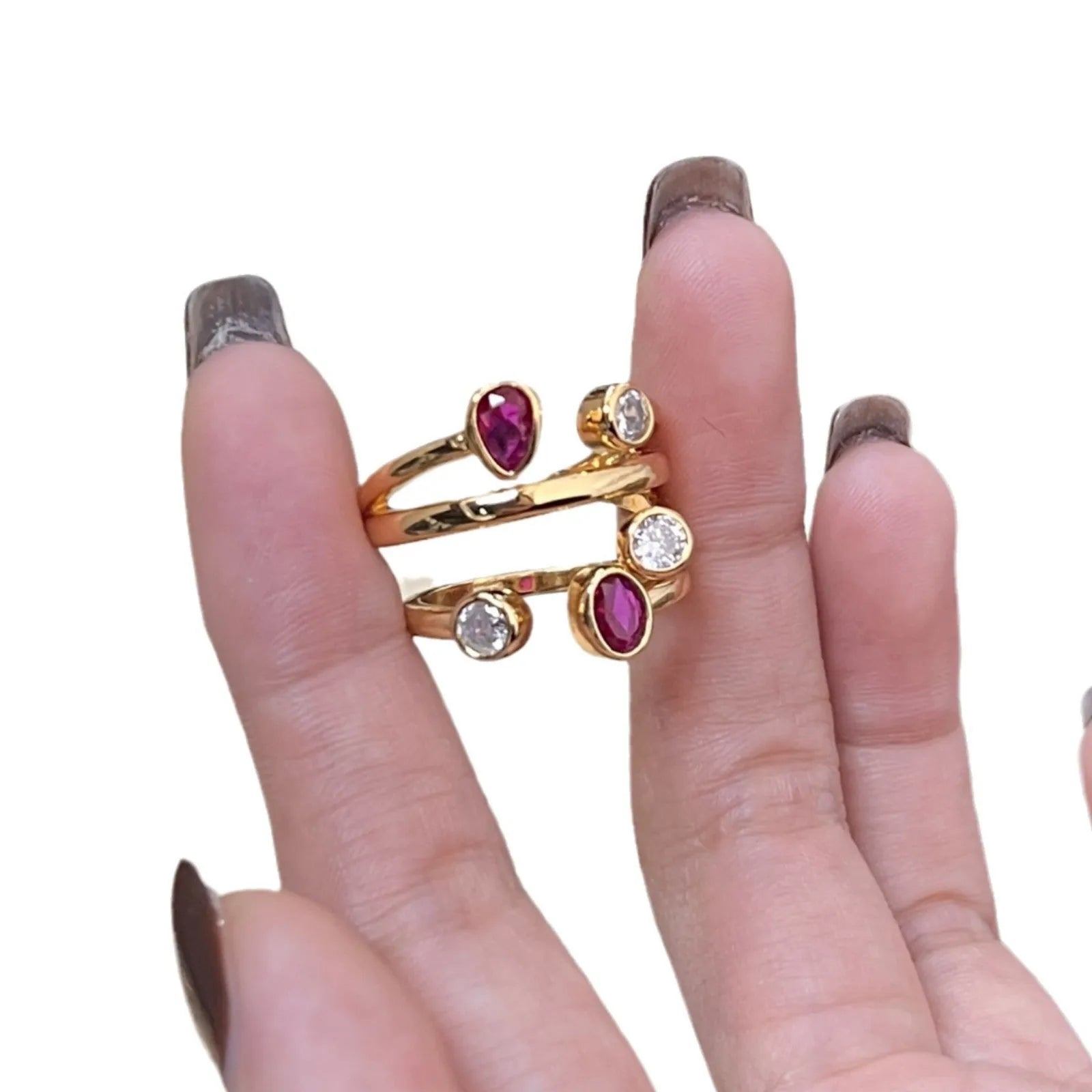 Retro two-tone geometric cross ring with a double-headed design and group diamond setting.
