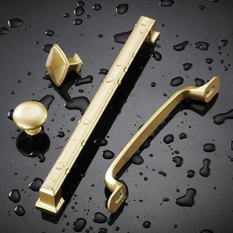 Modern gold T-shape aluminium alloy cabinet handle with three hole distance options.