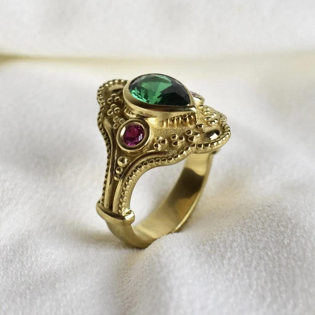 Women's golden Lvzuan geometric ring electroplated on alloy, shown on a hand